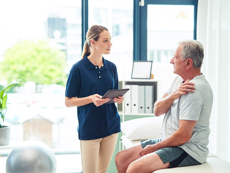 doctor talking to patient